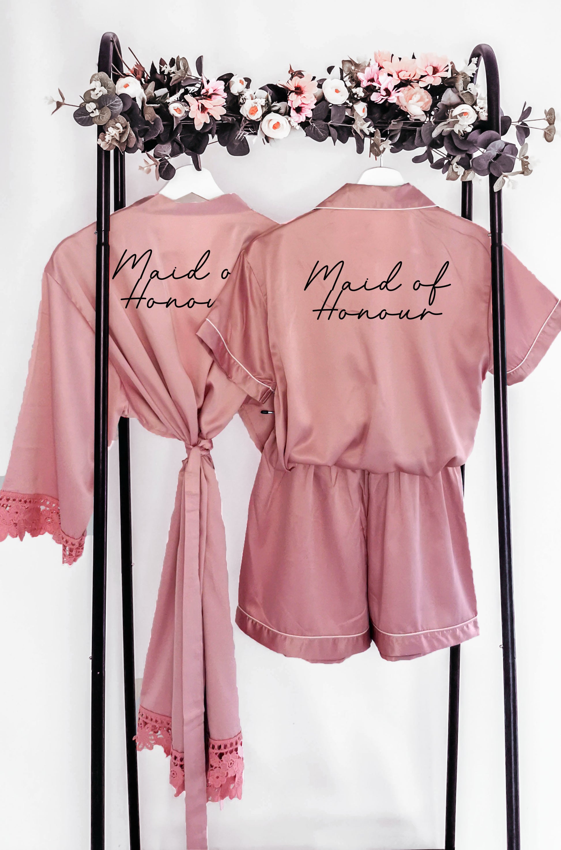 A beautifully crafted personalised wedding robe and pyjama set, featuring an elegant, minimalist font design. Perfect for brides, bridesmaids, and the bridal party, available in various sizes for a chic and timeless look.