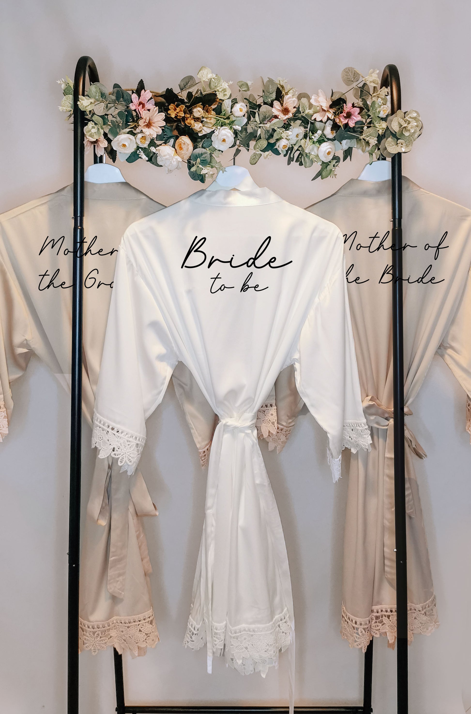 A beautifully crafted personalised wedding robe and pyjama set, featuring an elegant, minimalist font design. Perfect for brides, bridesmaids, and the bridal party, available in various sizes for a chic and timeless look.