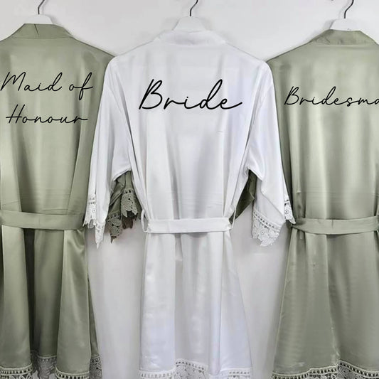 A beautifully crafted personalised wedding robe and pyjama set, featuring an elegant, minimalist font design. Perfect for brides, bridesmaids, and the bridal party, available in various sizes for a chic and timeless look.