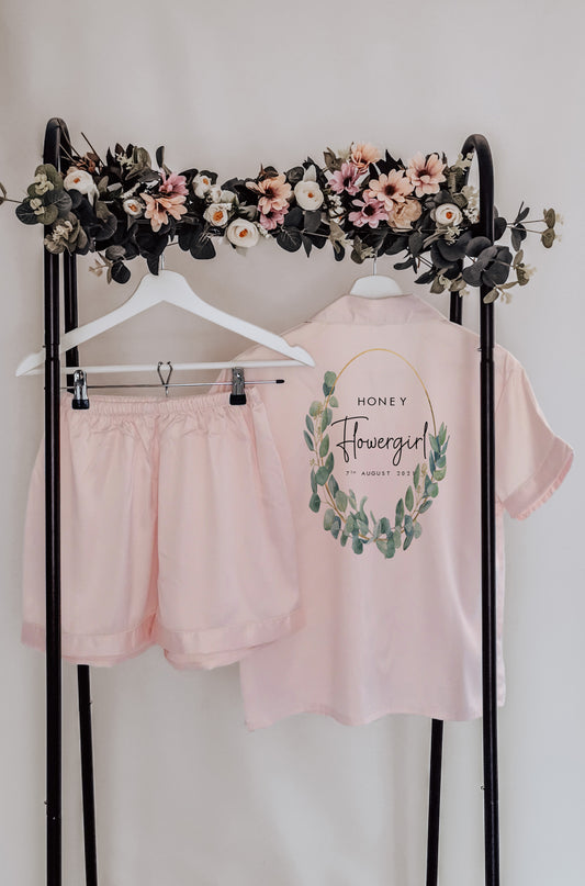 A beautifully designed personalised wedding robe and pyjama set featuring an elegant eucalyptus watercolour design. Perfect for brides, bridesmaids, and the bridal party, available in various sizes for a timeless and sophisticated look.