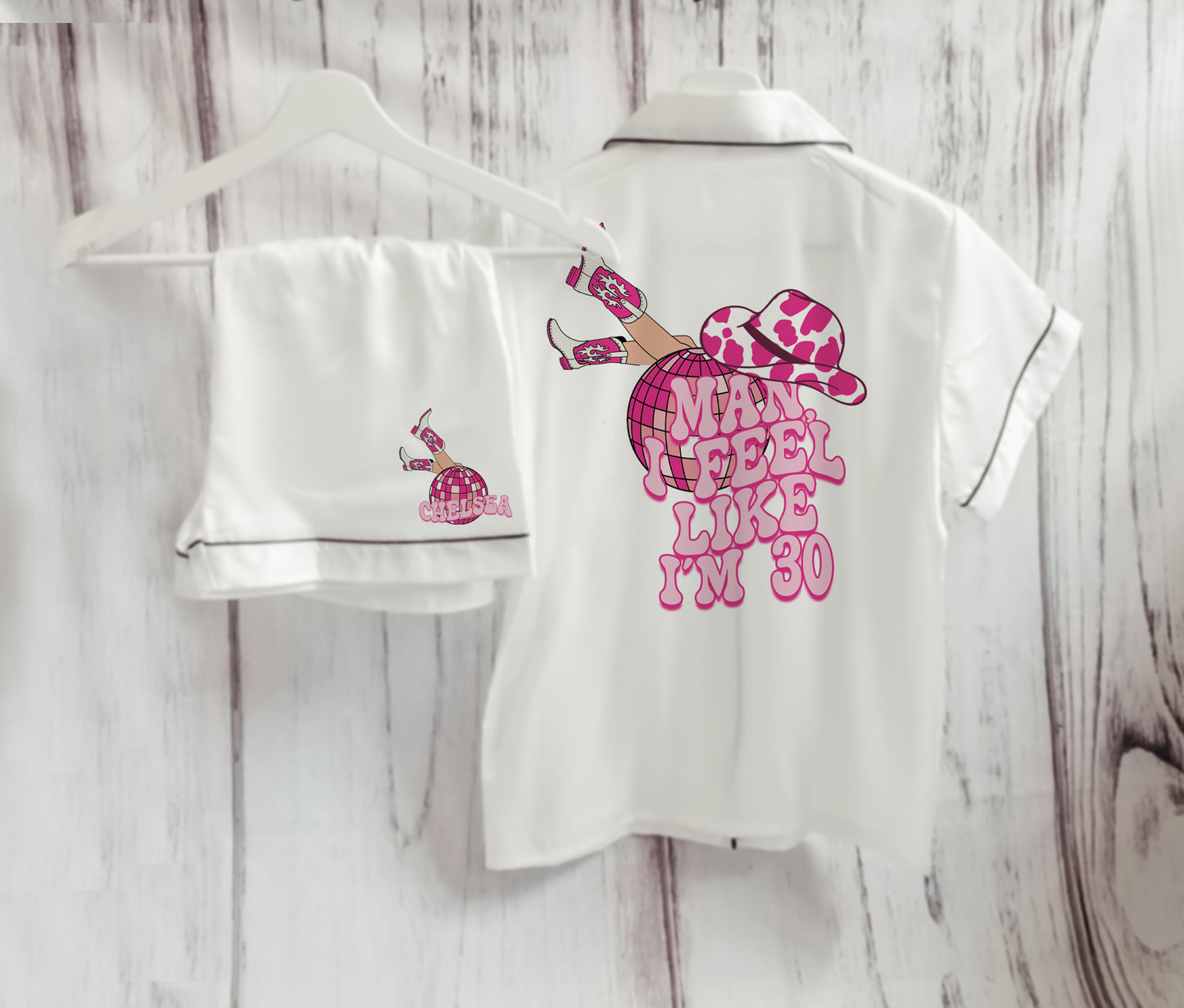 A cowgirl-themed personalised birthday pyjama set, featuring the phrase “Man, I Feel Like I’m (Age)” in a bold western font. The perfect fun and sassy birthday gift, available in luxury satin colours with an optional matching robe.

