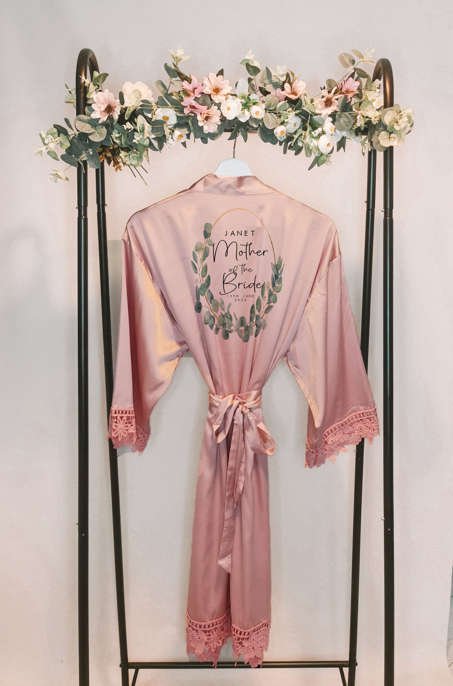 A beautifully designed personalised wedding robe and pyjama set featuring an elegant eucalyptus watercolour design. Perfect for brides, bridesmaids, and the bridal party, available in various sizes for a timeless and sophisticated look.

