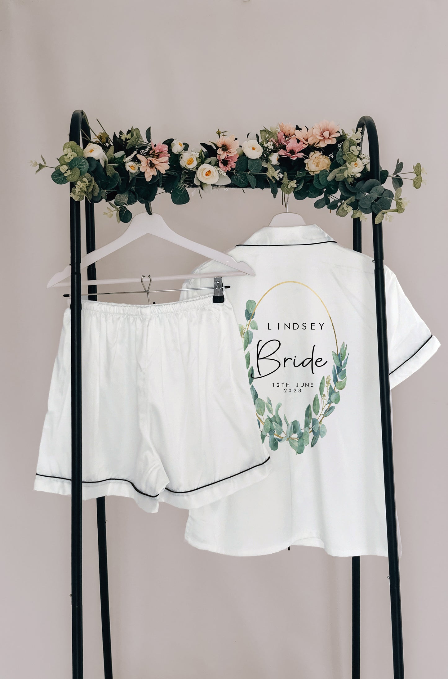 A beautifully designed personalised wedding robe and pyjama set featuring an elegant eucalyptus watercolour design. Perfect for brides, bridesmaids, and the bridal party, available in various sizes for a timeless and sophisticated look.

