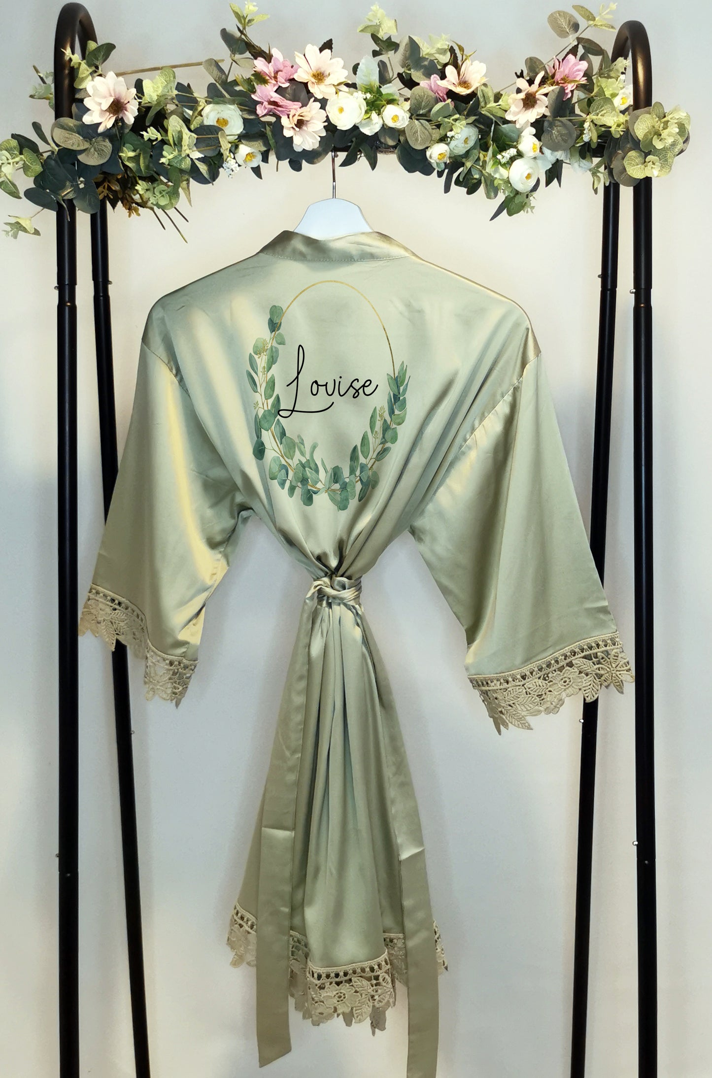 A beautifully designed personalised wedding robe and pyjama set featuring an elegant eucalyptus watercolour design. Perfect for brides, bridesmaids, and the bridal party, available in various sizes for a timeless and sophisticated look.

